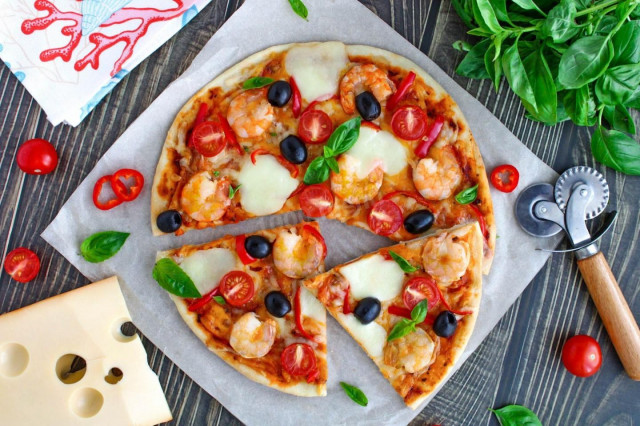 Homemade pizza with shrimp and cheese