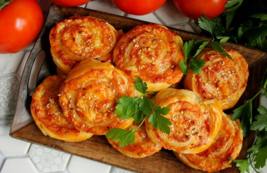 Puff pastry rolls with cheese and sausage