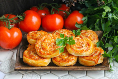 Puff pastry rolls with cheese and sausage