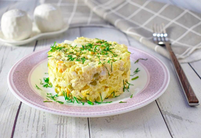 Olivier salad with chicken and cucumber