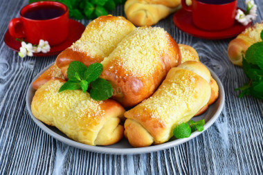 Buns with condensed milk boiled from yeast dough