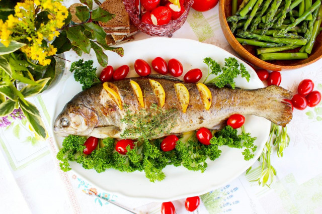 Fish in foil on coals