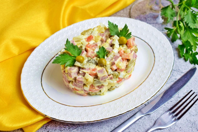 Classic Moscow salad with smoked sausage