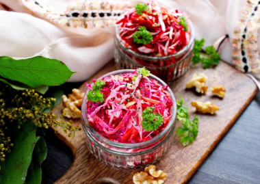Health salad with carrots beetroot cabbage and yogurt