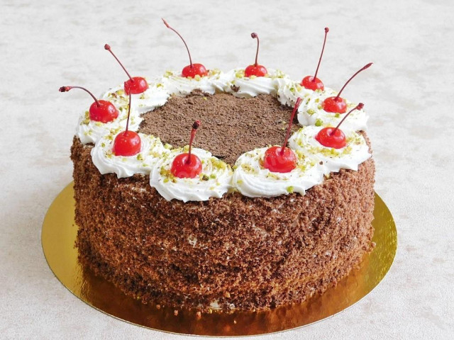 Chocolate cake with cherries and sour cream