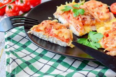 Chicken with cheese and tomatoes baked in the oven