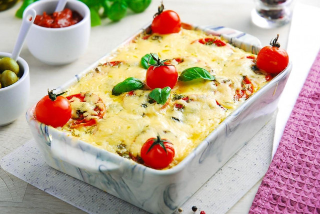 Zucchini casserole with chicken cheese and tomatoes