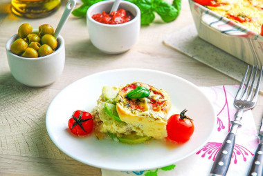 Zucchini casserole with chicken cheese and tomatoes