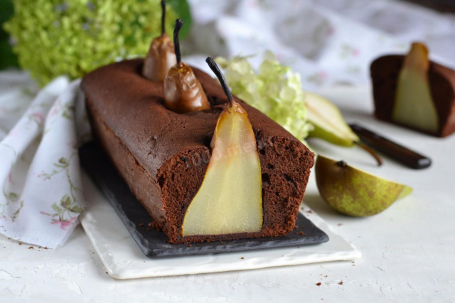 Pear chocolate cupcake with a whole pear