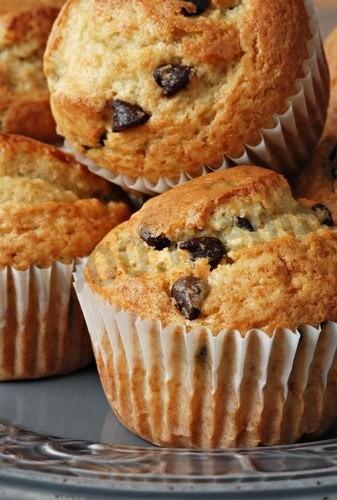 Muffins with pumpkin and raisins on sour cream