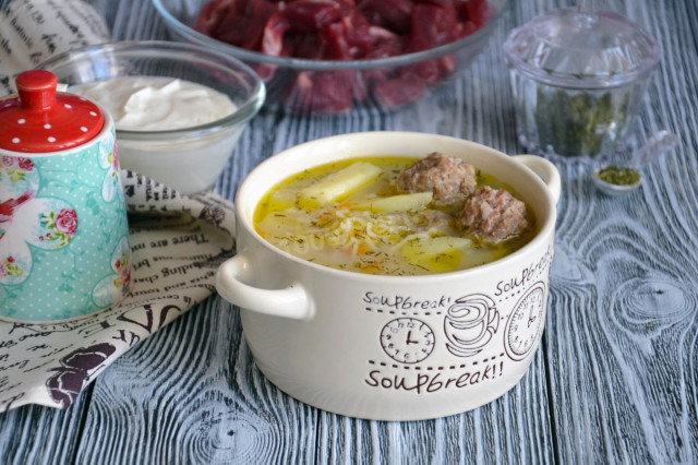 Soup with meatballs and rice