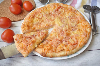 Pizza with smoked sausage and cheese