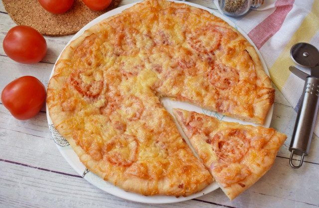 Pizza with smoked sausage and cheese