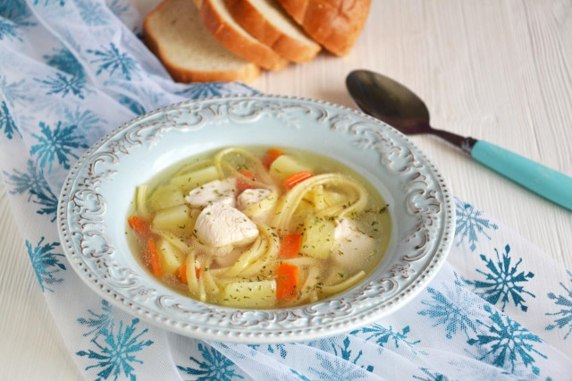 Chicken soup with noodles and potatoes