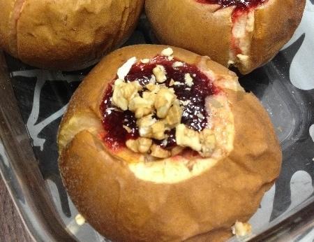 Baked apples with jam and nuts