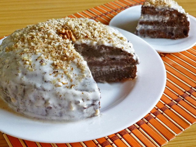 Chocolate sour cream sponge cake with walnuts