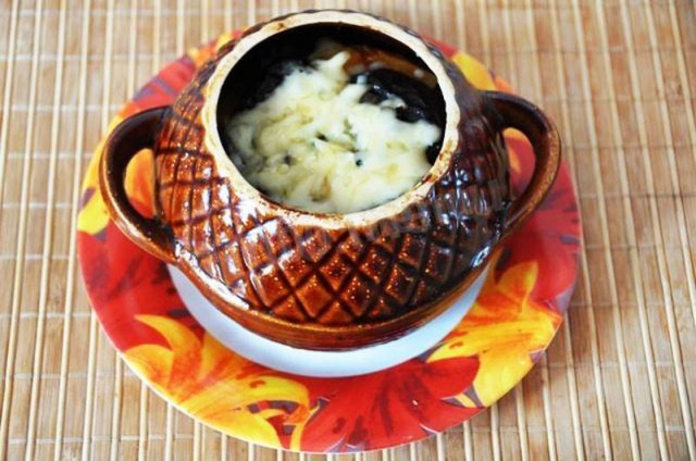 Meat with potatoes and pumpkin in a pot