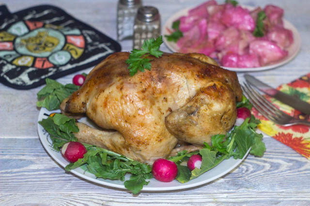 Foil-wrapped chicken in a marinade of soy sauce with ginger