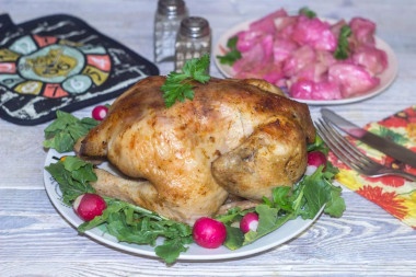 Foil-wrapped chicken in a marinade of soy sauce with ginger