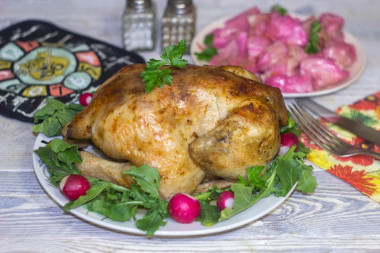 Foil-wrapped chicken in a marinade of soy sauce with ginger