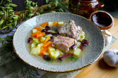 Thick soup in pots with pork ribs