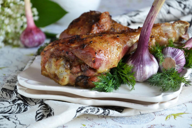 Turkey drumsticks with garlic baked in foil