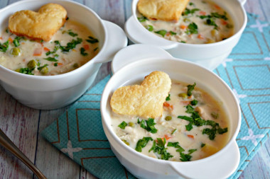 Chicken soup with puff pastry hearts