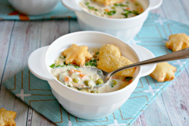 Chicken soup with puff pastry hearts