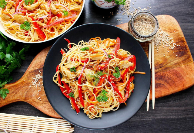 Udon noodles with chicken teriyaki sauce and vegetables