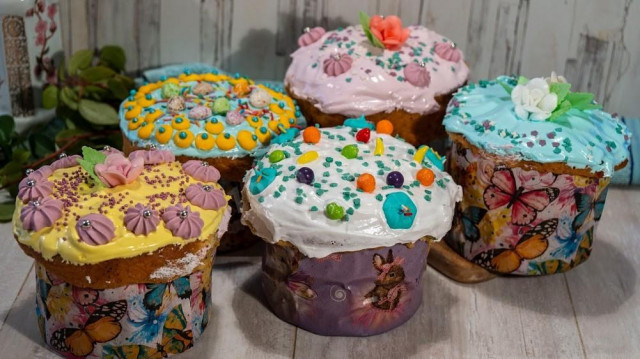 Easter cakes with dried apricots and candied fruits on yeast dough
