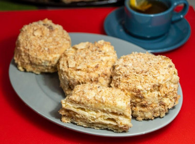 Napoleon cake with cream on condensed milk