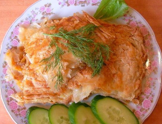 Layered cabbage pie, egg and carrot