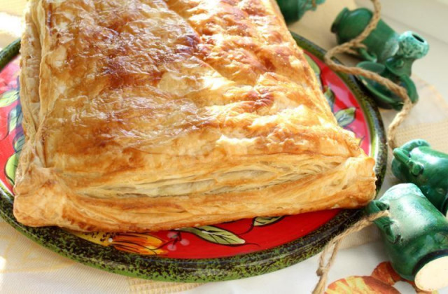 Greek puff pastry pie with minced meat and cheese