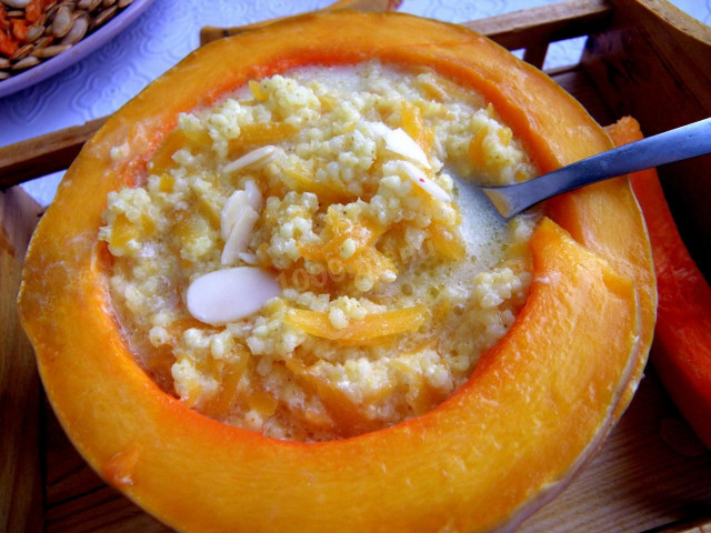 Pumpkin porridge in pumpkin with butter