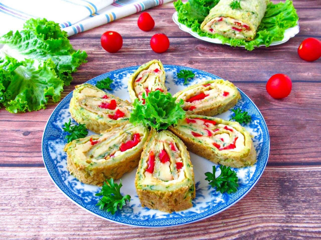 Zucchini roll with tomatoes and cheese