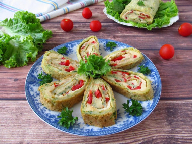 Zucchini roll with tomatoes and cheese