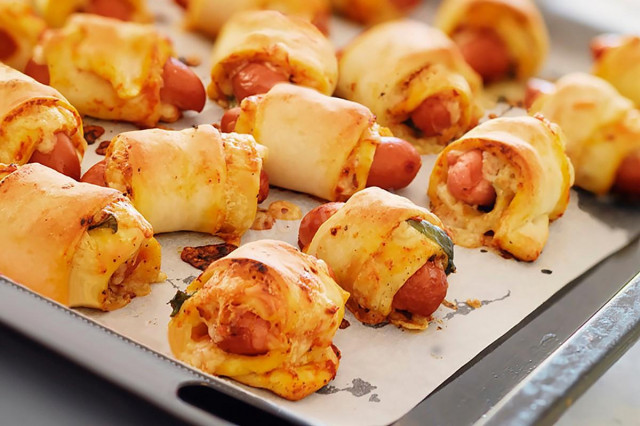Sausages in yeast dough with cheese