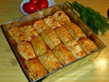 Stuffed cabbage rolls with minced meat in the oven in tomato sauce