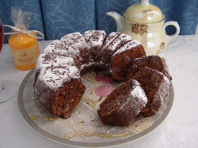 Chocolate cupcake with raisins and nuts