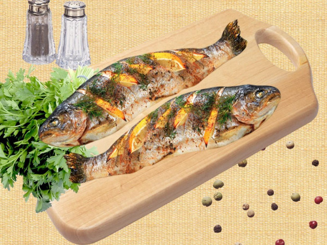 Baked trout in foil with lemon