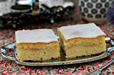 Shortbread pie with icing and apple filling