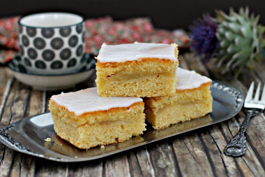 Shortbread pie with icing and apple filling