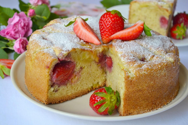 Airy sponge cake with rhubarb and strawberries
