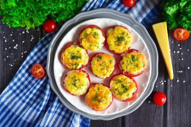 Tomatoes with cheese and garlic in the oven