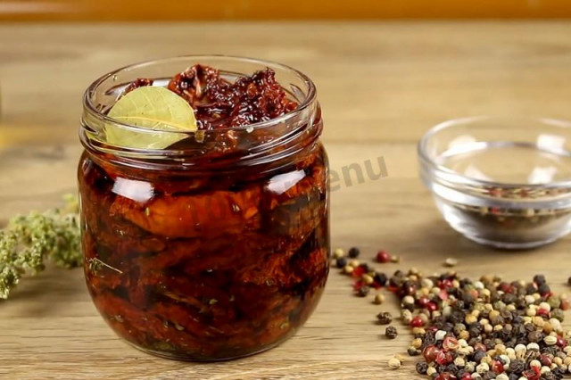 Dried tomatoes at home in olive oil