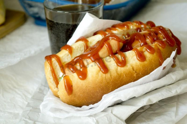 Hot dog with egg and crab sticks in yeast dough