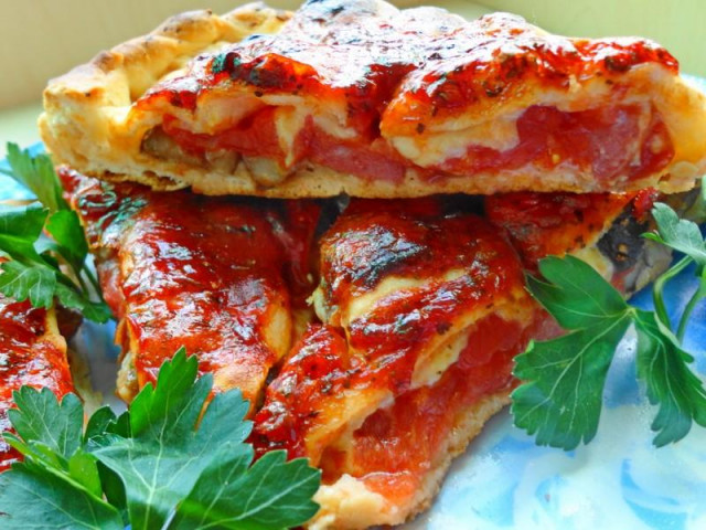 Pizza Calzone with smoked sausages and mushrooms