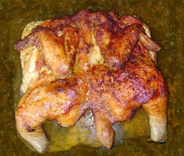 Tobacco chicken in butter