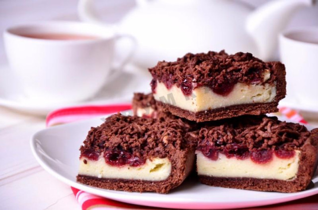 Chocolate cake with cottage cheese and cherries