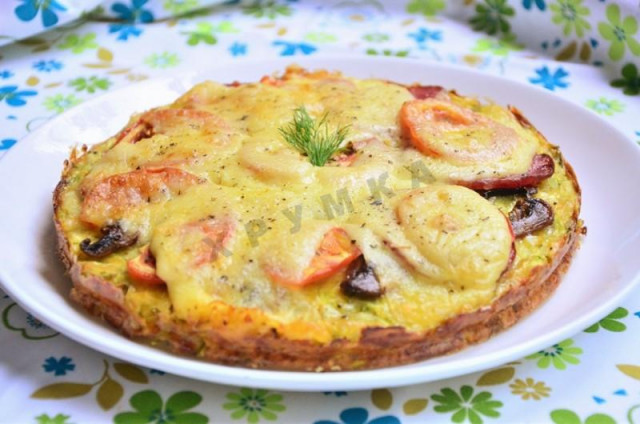 Snack pie with tomatoes, cheese and zucchini